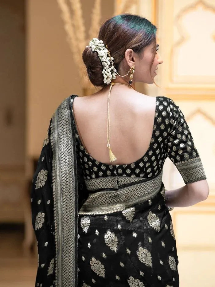 Charming Black Party Wear Saree with Golden Zari Design