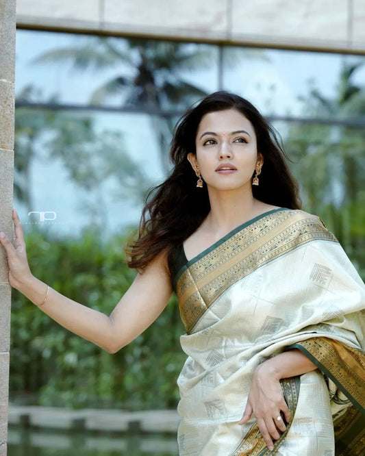 Elegant Cream Silk Saree with Green Golden Border