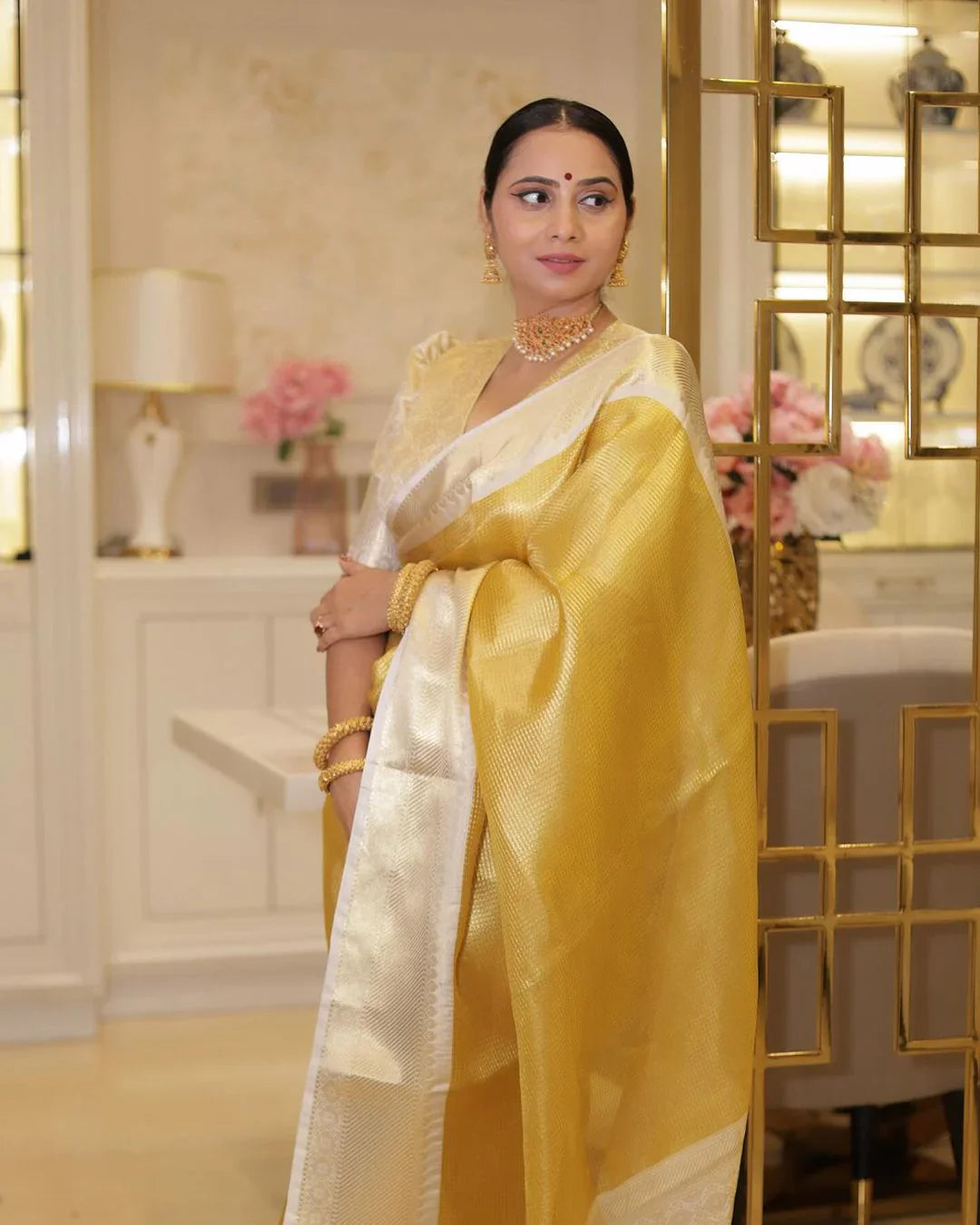 Traditional Yellow Silk Saree with Elegant Golden Zari Weaving