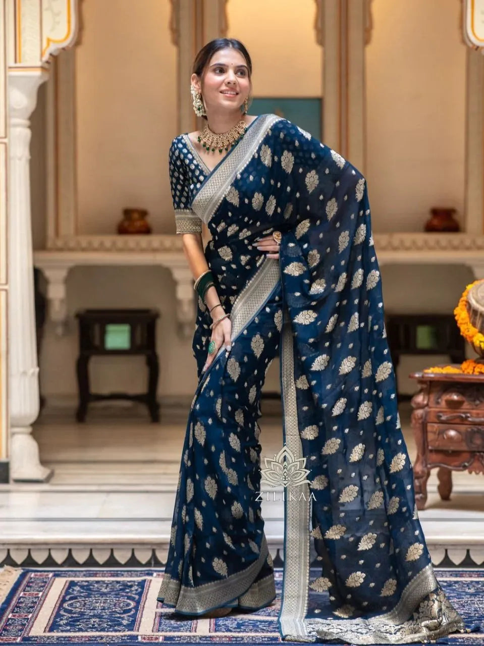 Charming Black Party Wear Saree with Golden Zari Design