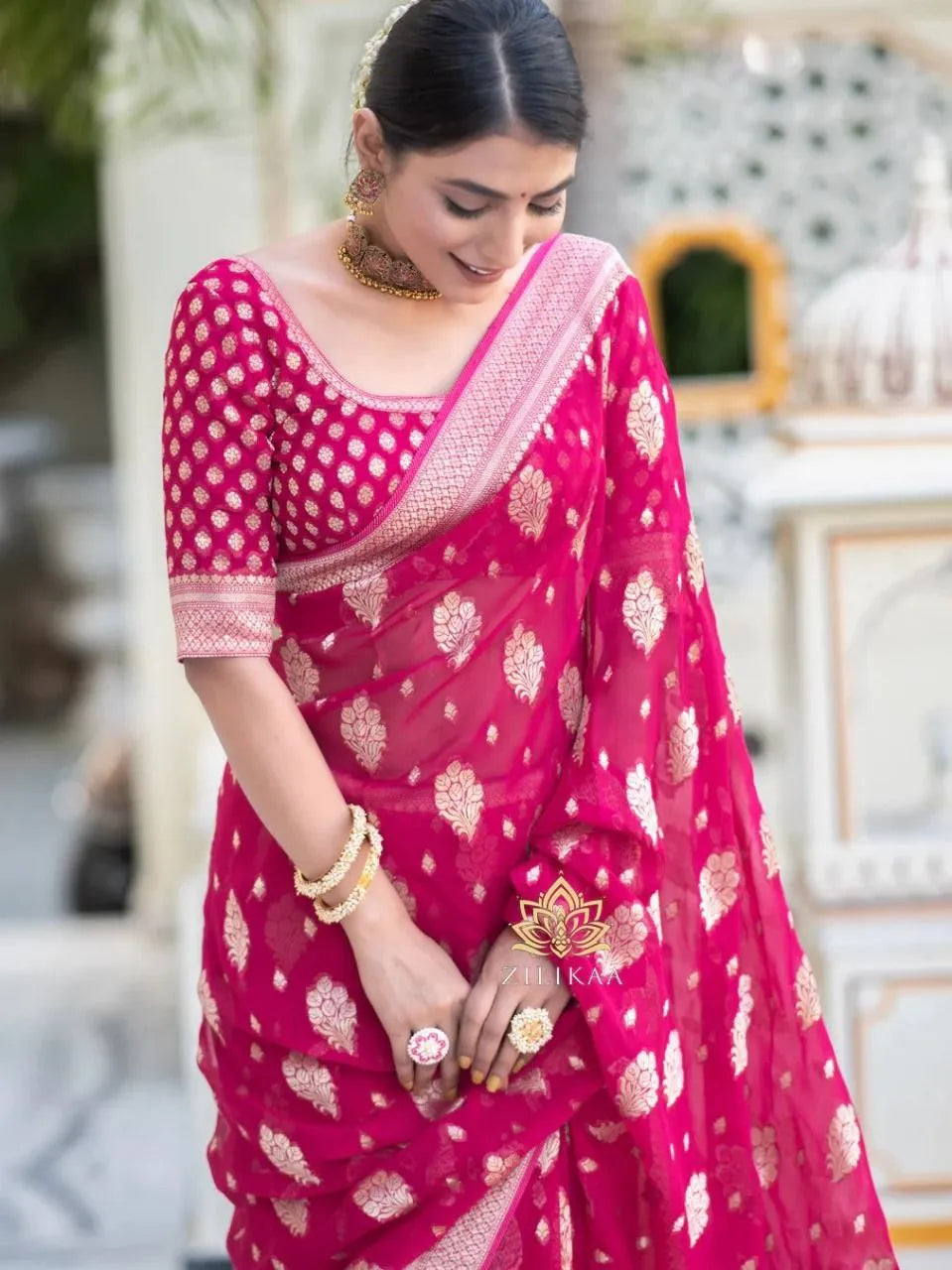 Charming Black Party Wear Saree with Golden Zari Design