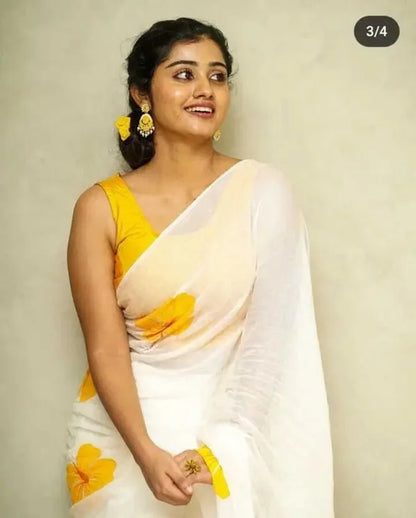 Elegant White Saree with Bright Yellow Floral Prints