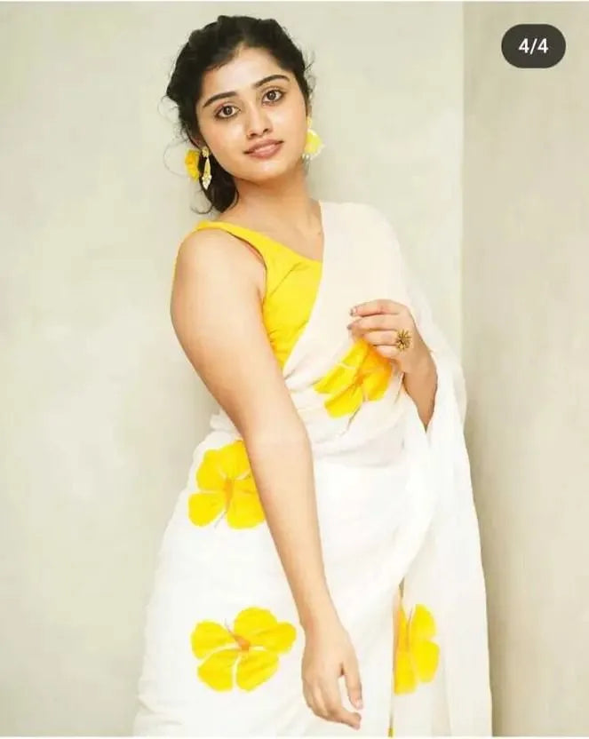 Elegant White Saree with Bright Yellow Floral Prints
